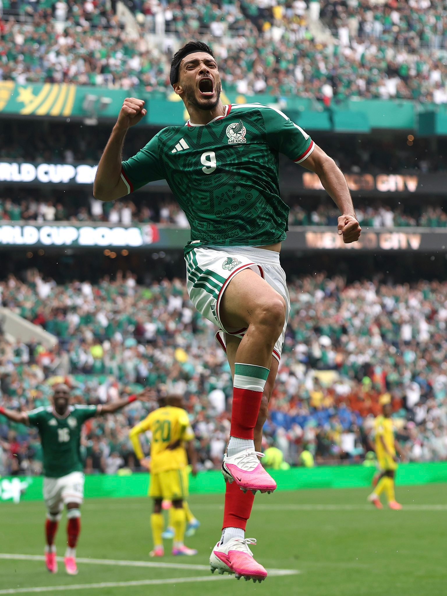 Mexico players celebrating against South Africa