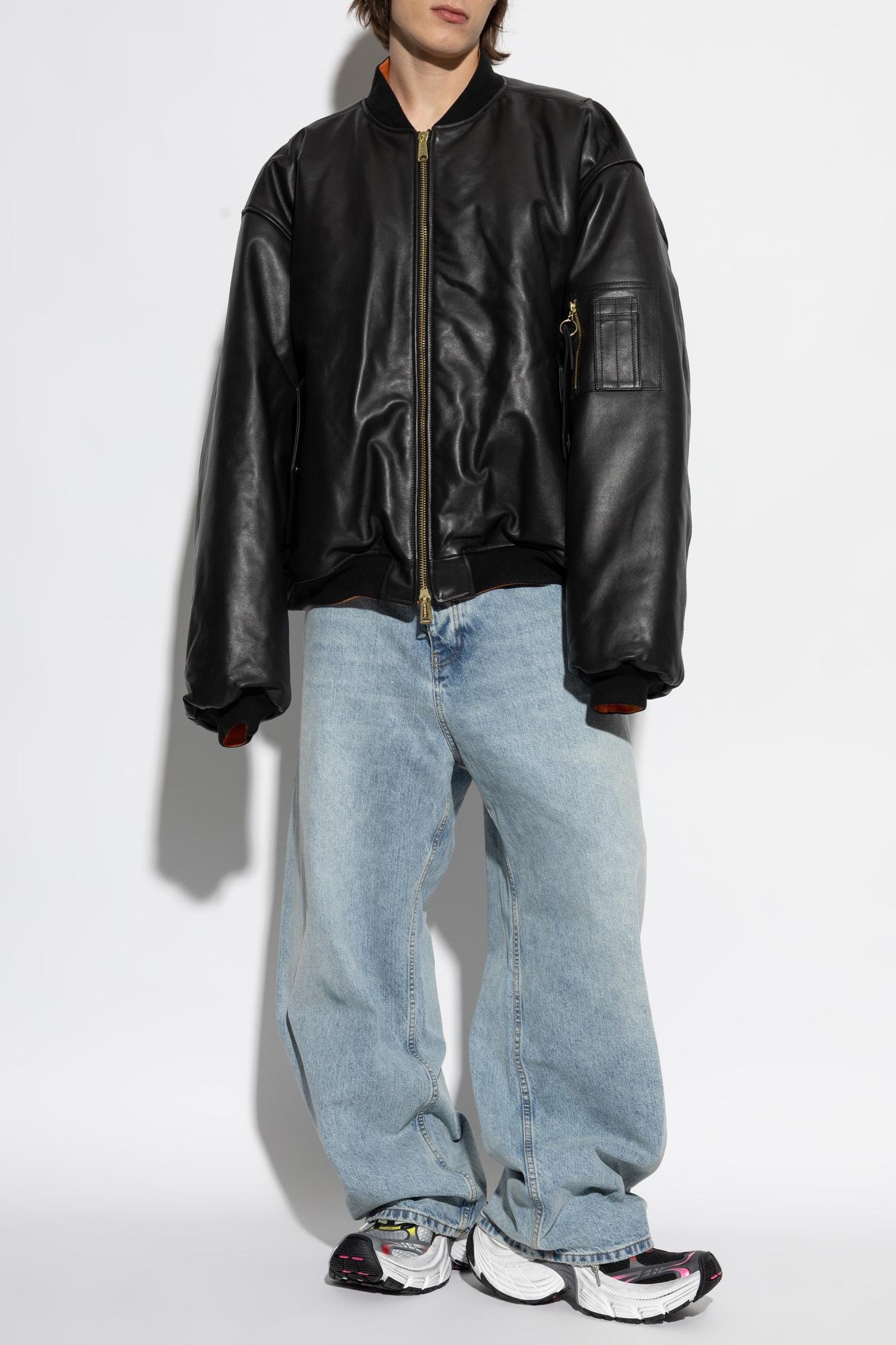 Statement fashion outfit featuring a leather jacket, relaxed trousers and distinctive accessories