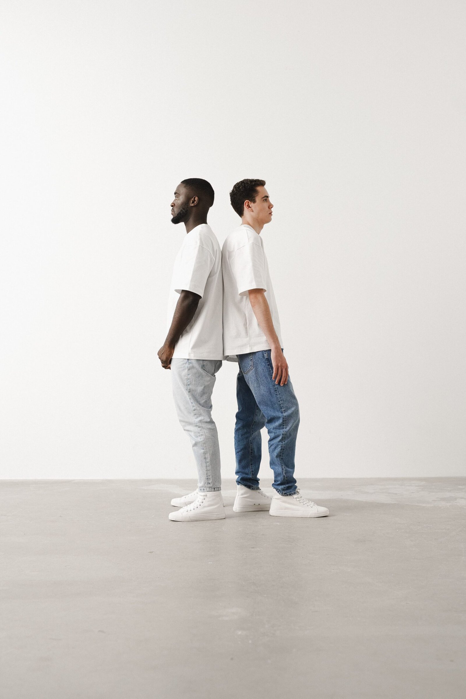 Everyday contemporary outfit combining relaxed denim, a clean top and versatile footwear