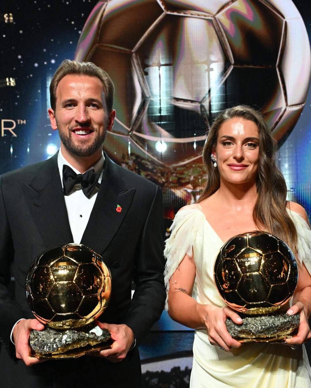 Harry Kane holding the 2026 men's Ballon d'Or trophy